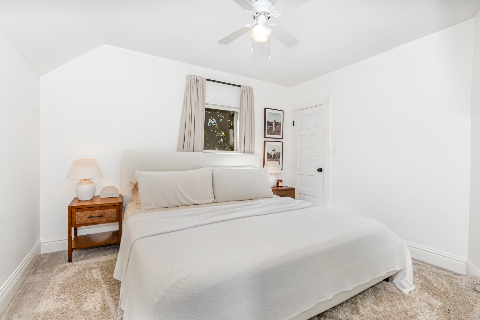 19429 Wolf Road Mokena, IL 60448 - Photo 12 of 18 a bedroom with a bed and a chandelier