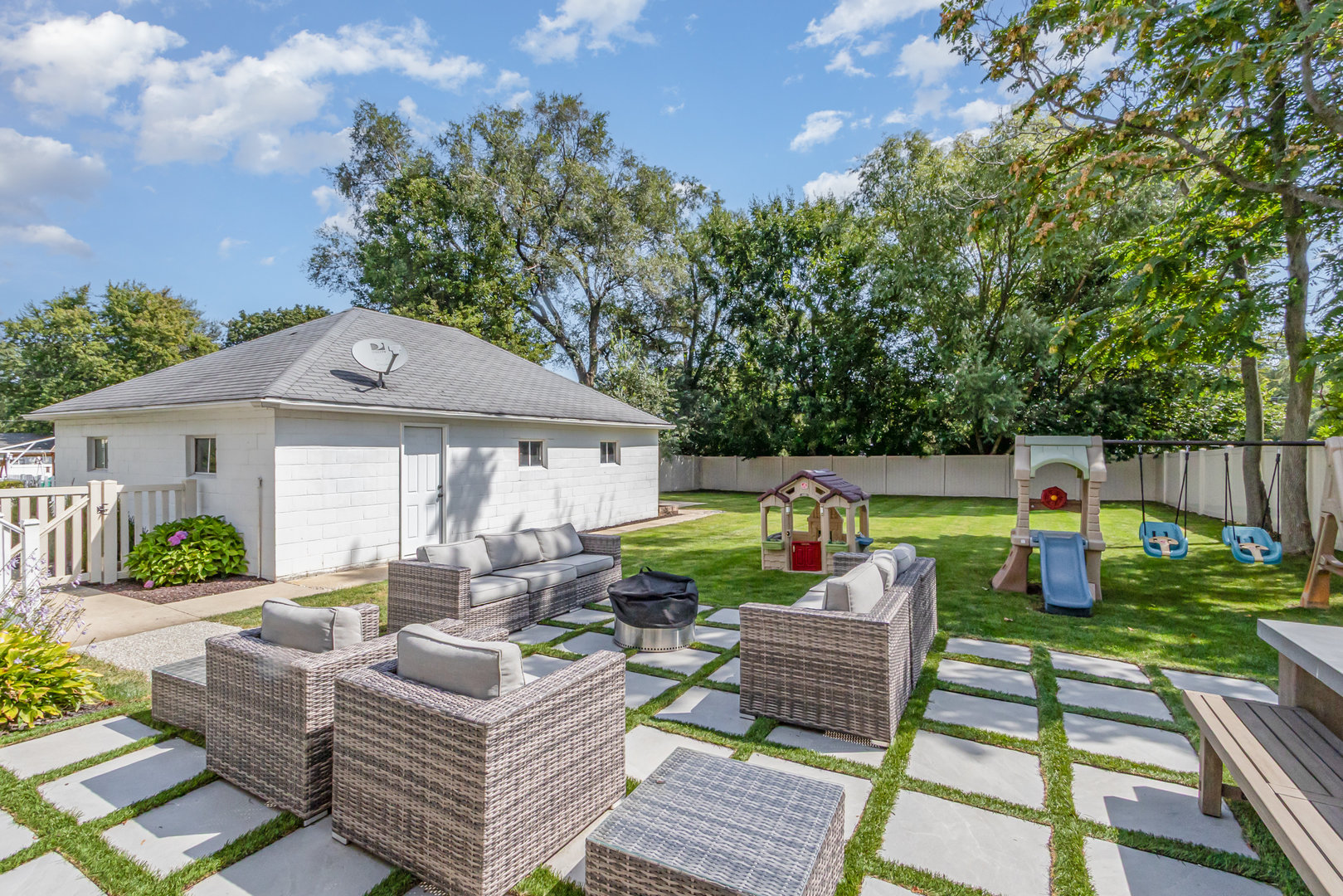 19429 Wolf Road Mokena, IL 60448 - Photo 16 of 18 a view of a patio with couches chairs and a fire pit