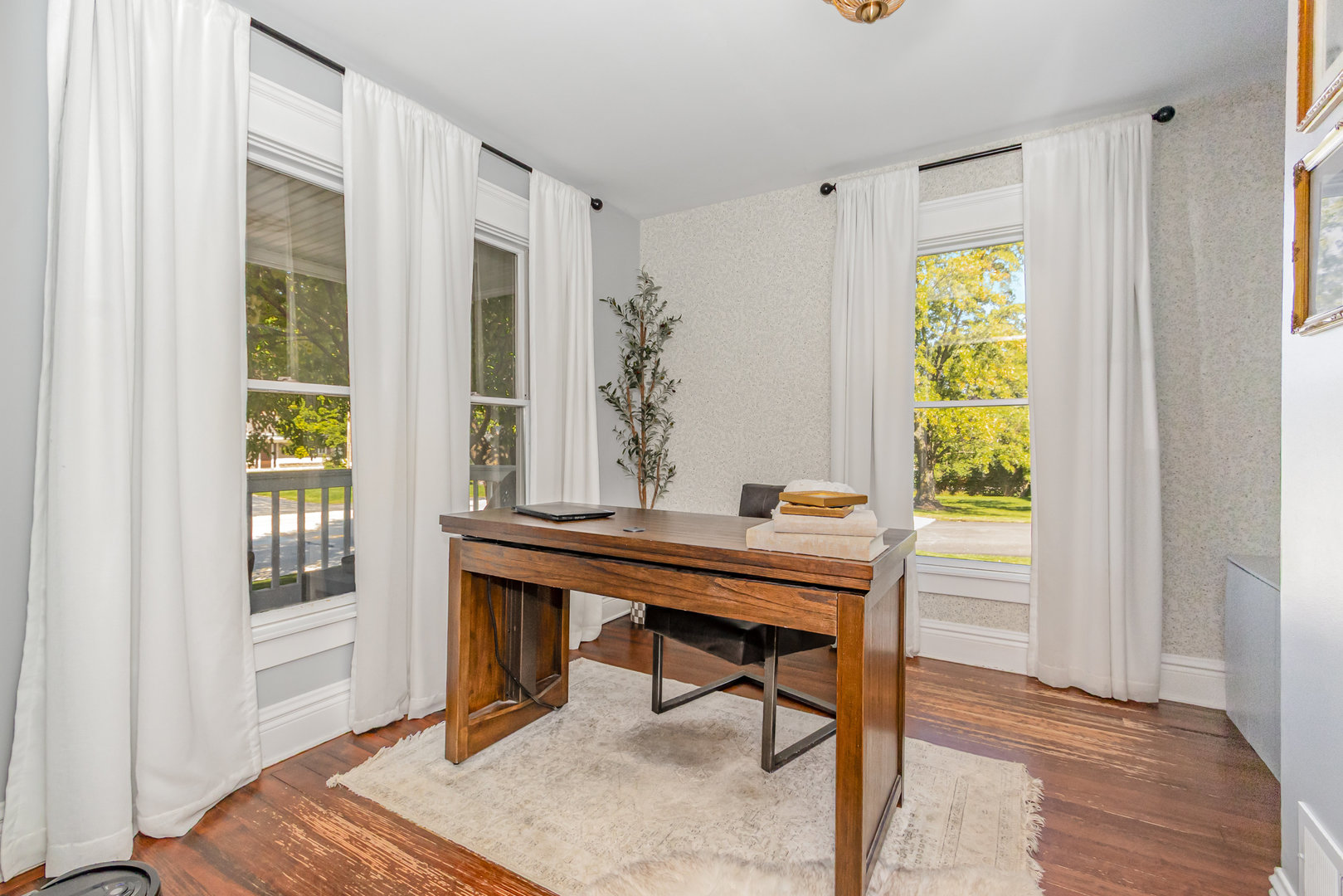 19429 Wolf Road Mokena, IL 60448 - Photo 10 of 18 a view of a workspace with furniture and a window