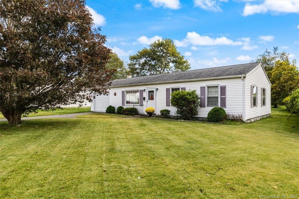 184 Indian Field Road Groton, CT 06340 - Photo 1 of 1 a front view of house with swimming pool and porch with green space