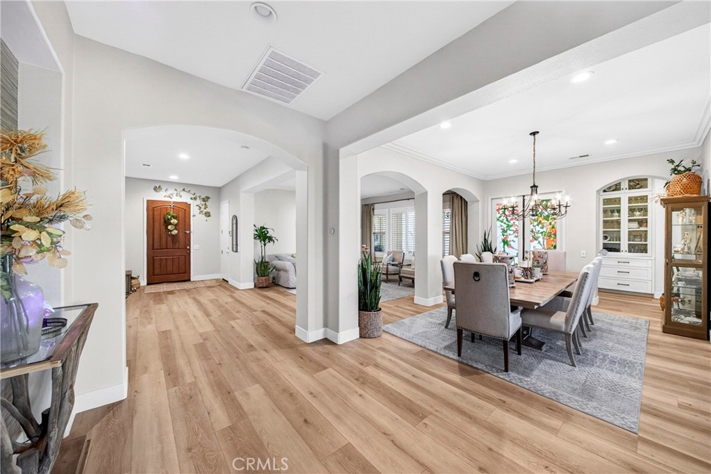 16375 Ory Circle Riverside, CA 92503 - Photo 7 of 51 a view of a dining room with furniture window and wooden floor