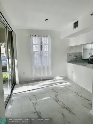 $345,000 | 6500 West Sample Road, Unit 6500, Coral Springs, FL 33067