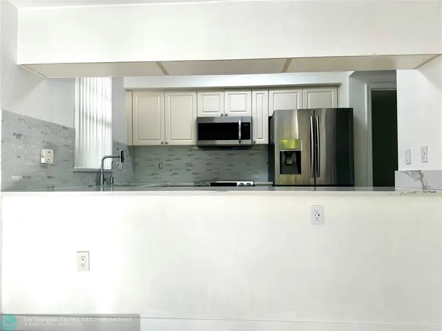 $345,000 | 6500 West Sample Road, Unit 6500, Coral Springs, FL 33067