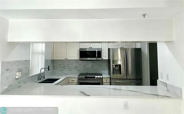 $345,000 | 6500 West Sample Road, Unit 6500, Coral Springs, FL 33067