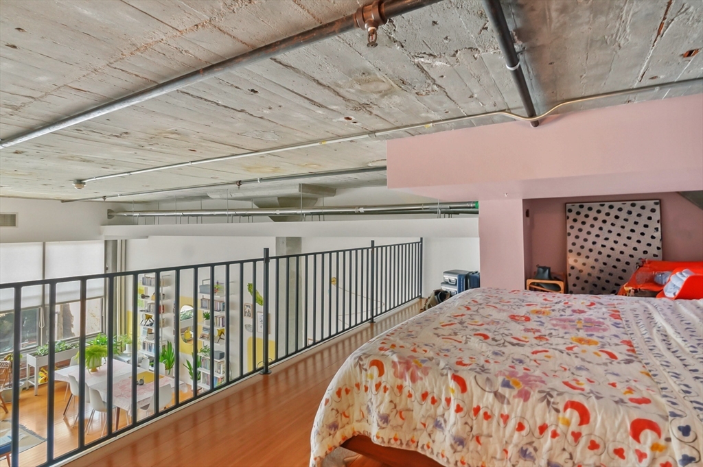156 Porter Street, Unit 246 Boston, MA 02128 - Photo 15 of 25 a bedroom with a bed and a window