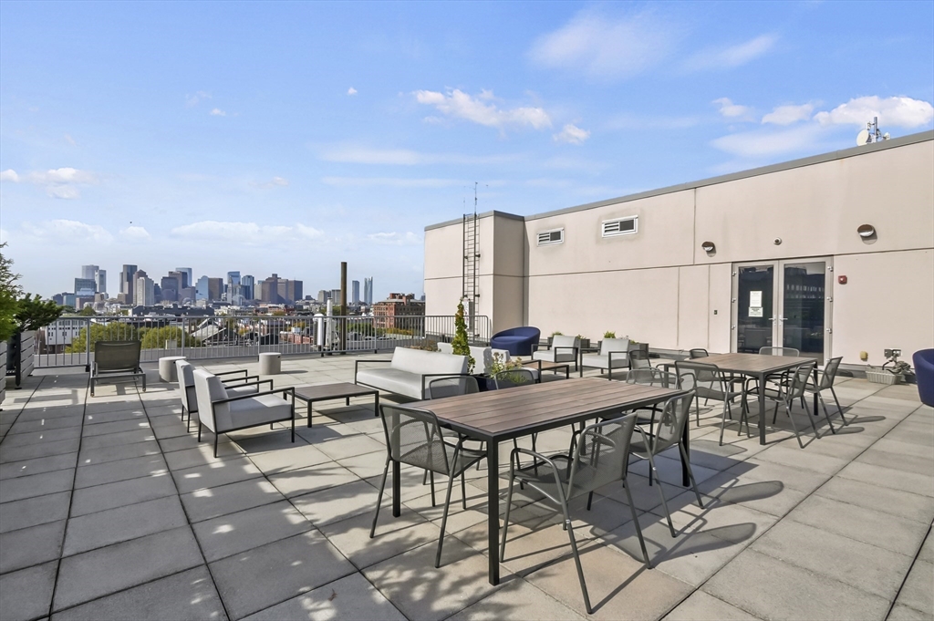 156 Porter Street, Unit 246 Boston, MA 02128 - Photo 18 of 25 a view of a patio