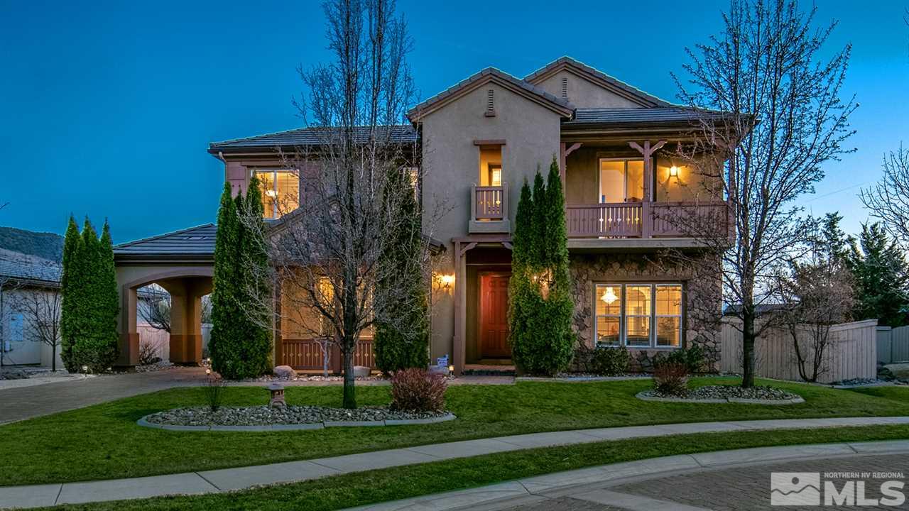 2630 Fury Court Reno, NV 89521 - Photo 1 of 25 a front view of a house with a yard