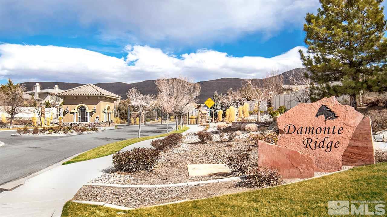 2630 Fury Court Reno, NV 89521 - Photo 3 of 25 a view of a white house with a yard