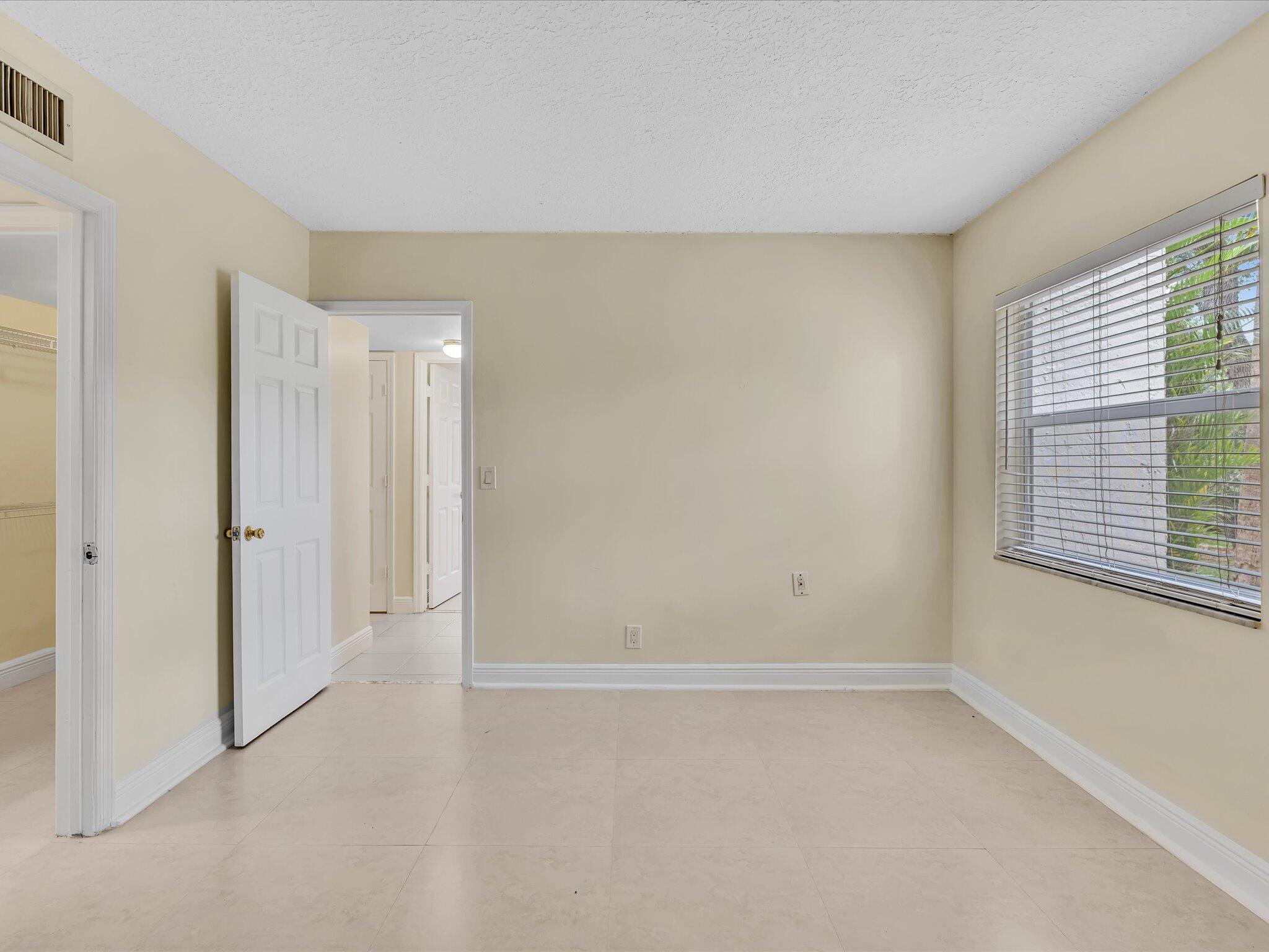 644 Northwest 13th Street, Unit 160 Boca Raton, FL 33486 - Photo 15 of 54 Entrance Primary Suite