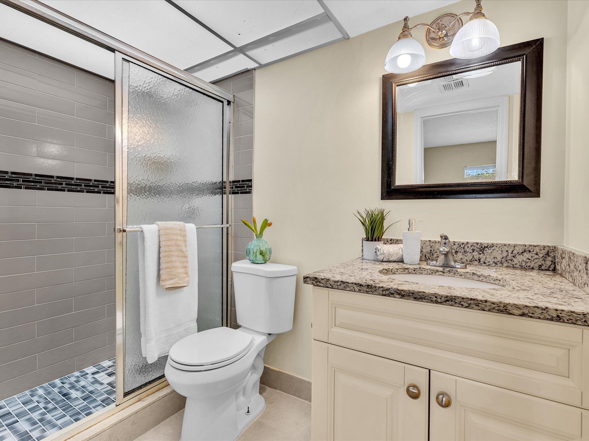 644 Northwest 13th Street, Unit 160 Boca Raton, FL 33486 - Photo 18 of 54 Primary En Suite Bath