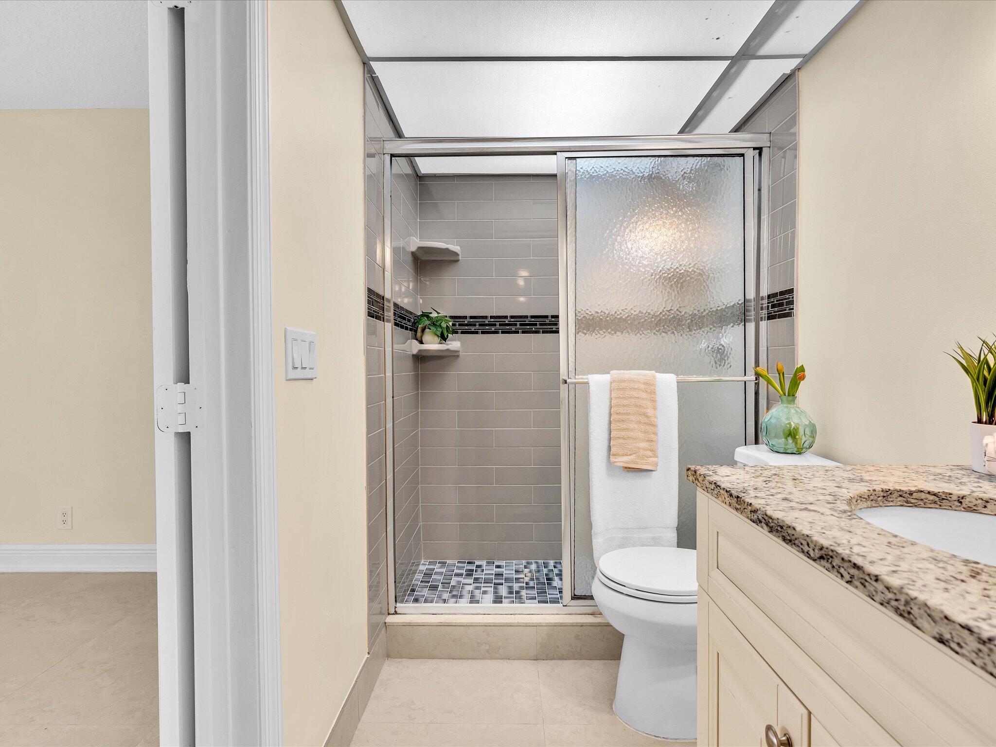 644 Northwest 13th Street, Unit 160 Boca Raton, FL 33486 - Photo 19 of 54 Primary Bath Shower
