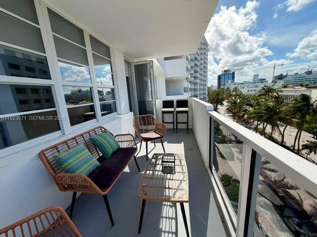 100 Lincoln Road, Unit 541 Miami Beach, FL 33139 - Photo 15 of 17 a view of a living room and wooden floor