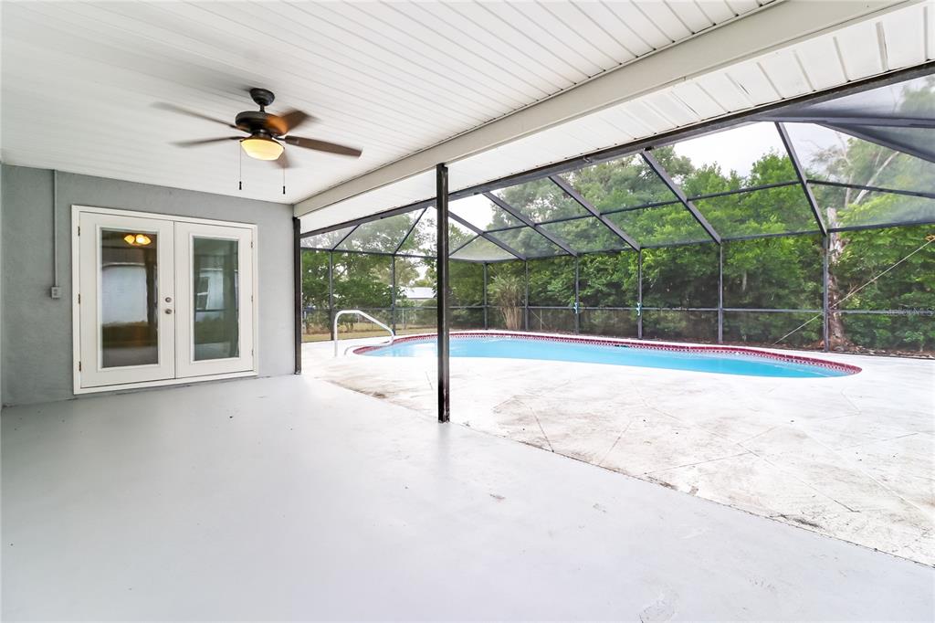 Undisclosed Address Spring Hill, FL 34609 - Photo 13 of 15 a view of an empty room with a balcony