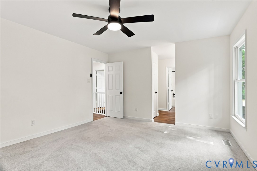 2549 Retrievers Ridge Road Henrico, VA 23233 - Photo 27 of 47 Spacious interior with neutral carpeting and a cei