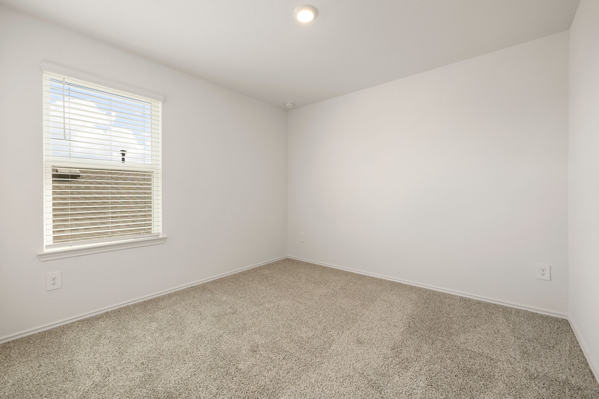 31007 Delamere Fulshear, TX 77441 - Photo 11 of 22 an empty room with a window