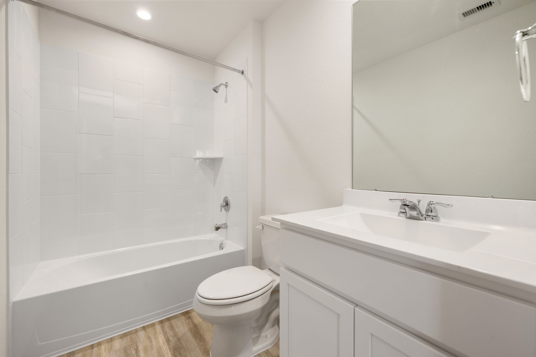 31007 Delamere Fulshear, TX 77441 - Photo 12 of 22 a bathroom with a sink a toilet and a bathtub