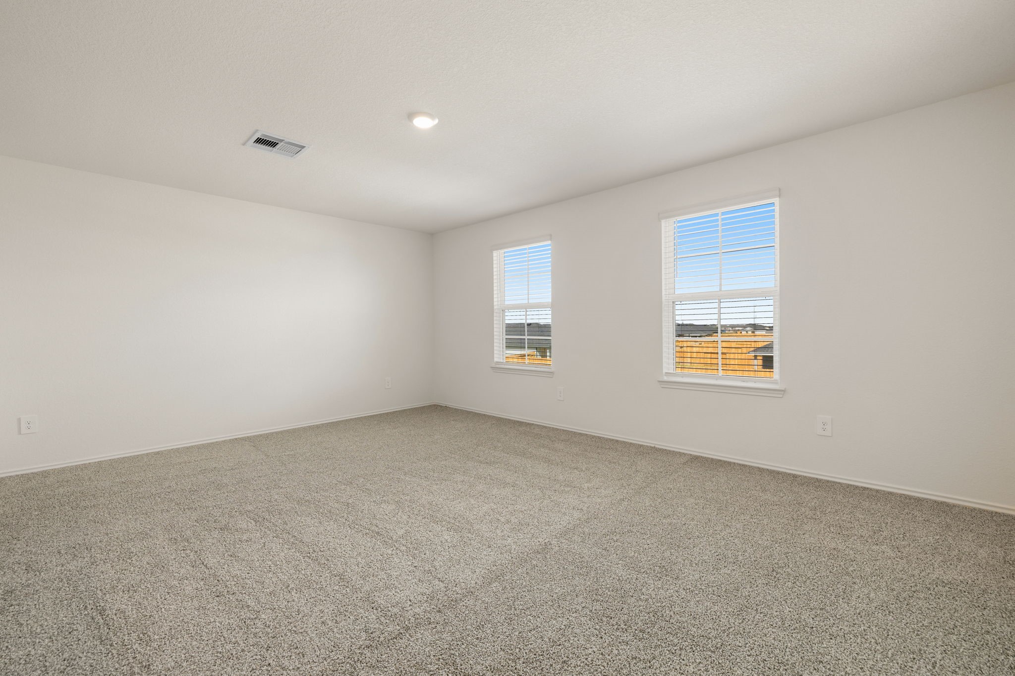 31007 Delamere Fulshear, TX 77441 - Photo 13 of 22 an empty room with windows
