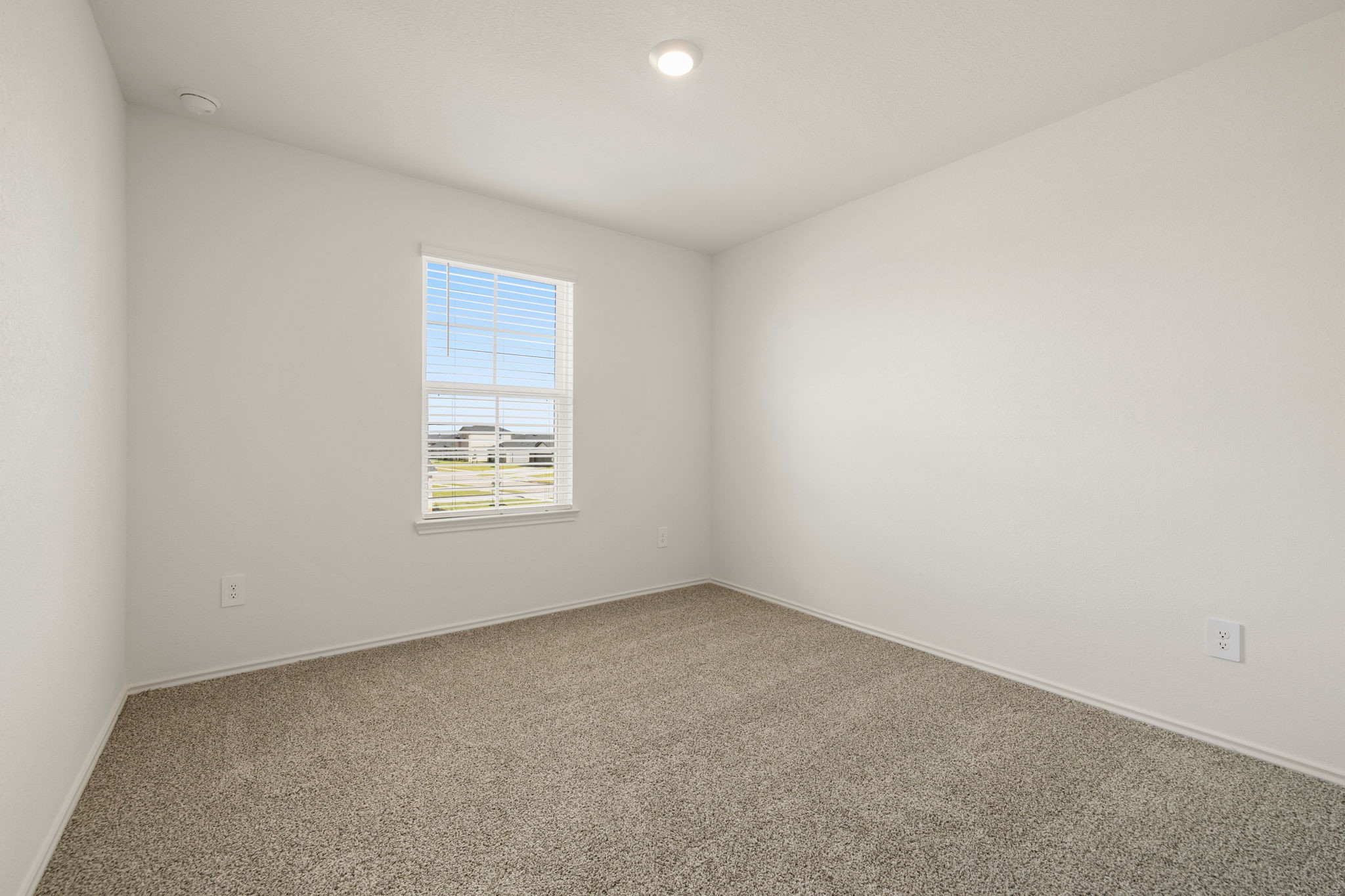 31007 Delamere Fulshear, TX 77441 - Photo 14 of 22 an empty room with a window