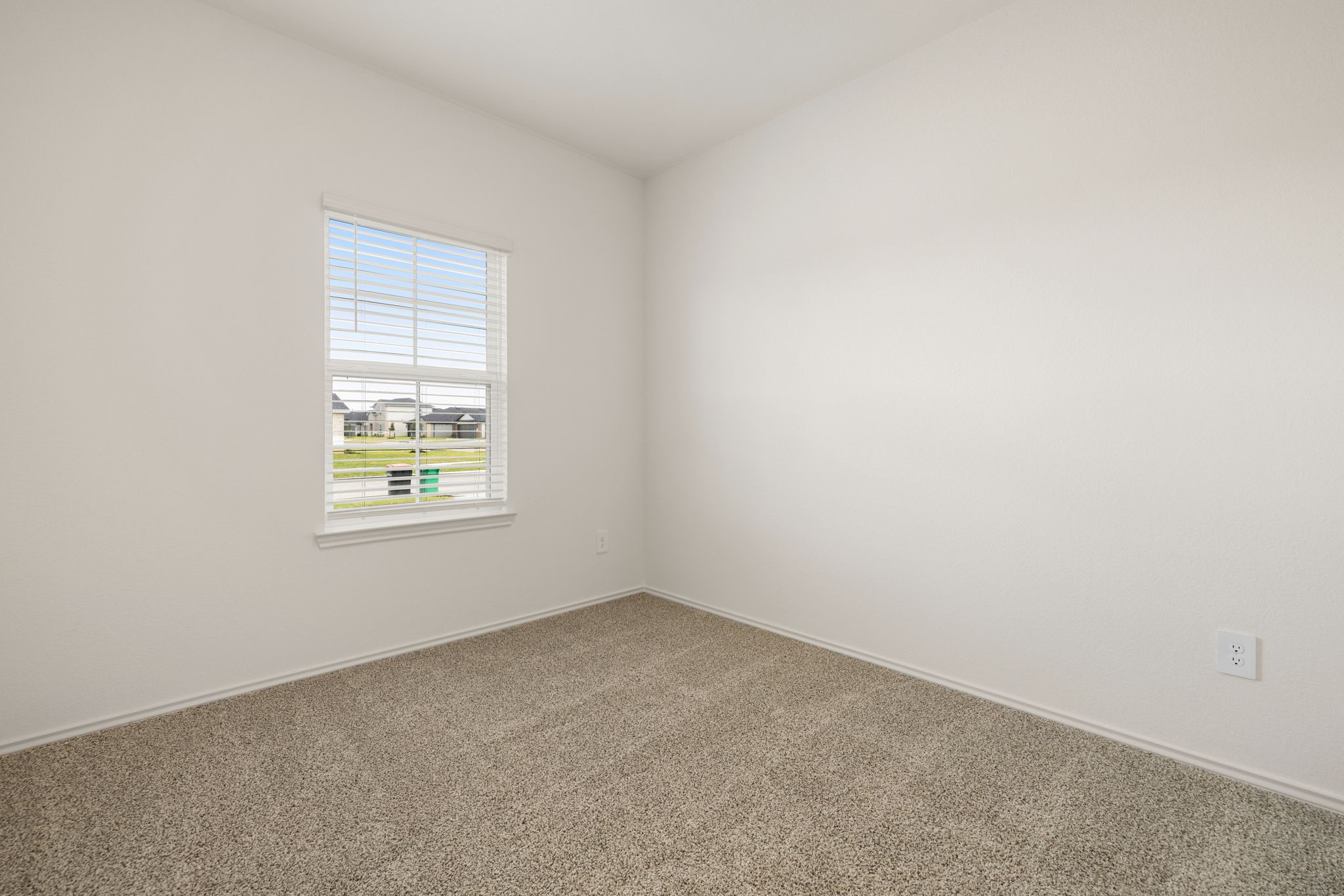 31007 Delamere Fulshear, TX 77441 - Photo 16 of 22 an empty room with a window