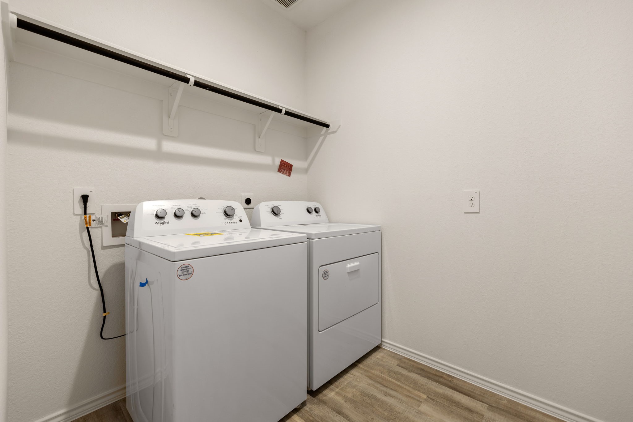 31007 Delamere Fulshear, TX 77441 - Photo 17 of 22 a utility room with dryer and washer