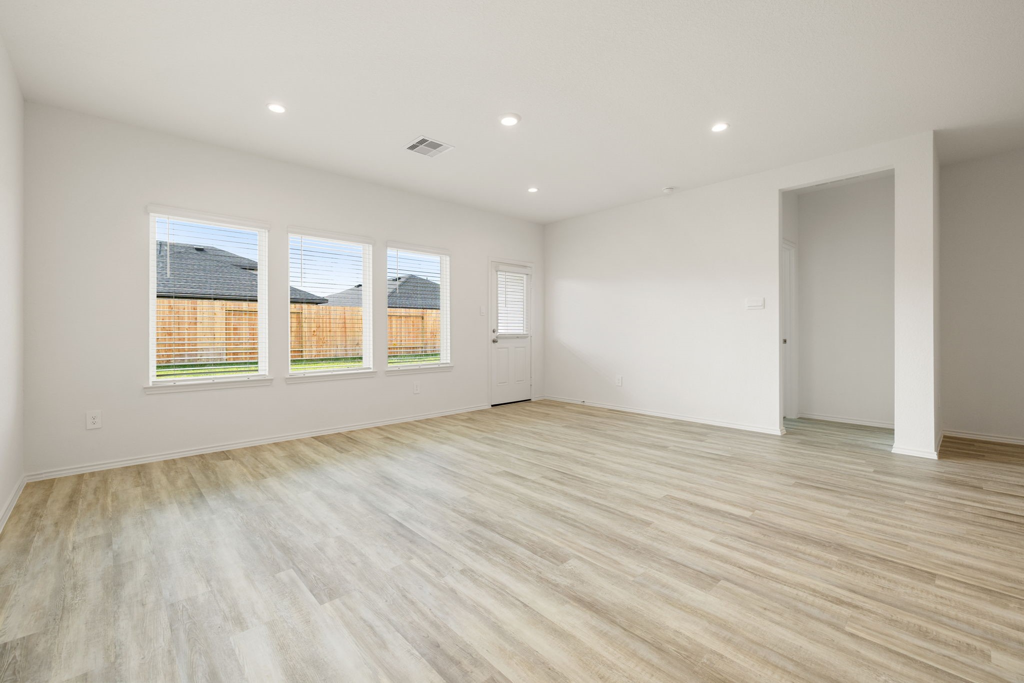 31007 Delamere Fulshear, TX 77441 - Photo 4 of 22 a view of empty room with wooden floor and fan