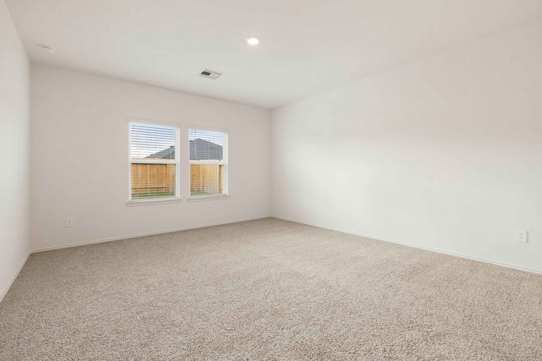 31007 Delamere Fulshear, TX 77441 - Photo 7 of 22 an empty room with windows