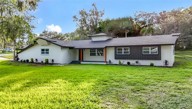 a view of a house with a garden