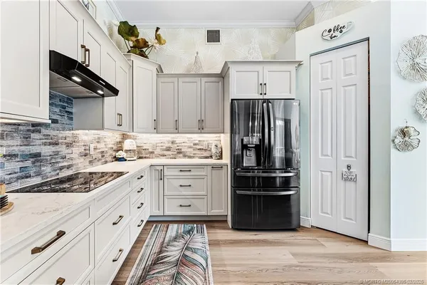 $945,000 | 6919 Southeast Sleepy Hollow Lane, Stuart, FL 34997