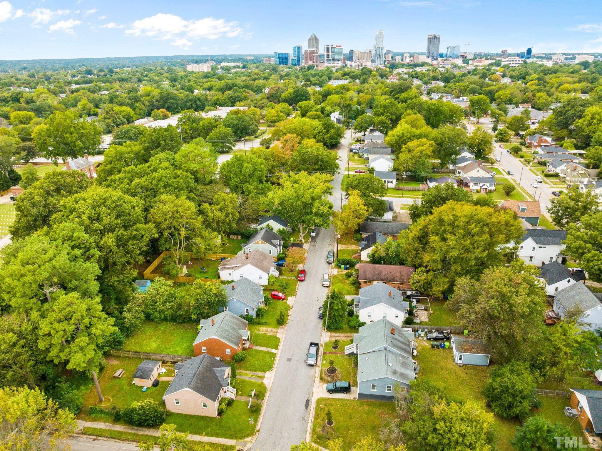 1212 Gatling Street Raleigh, NC 27610 - Photo 2 of 15 an aerial view of residential houses with yard