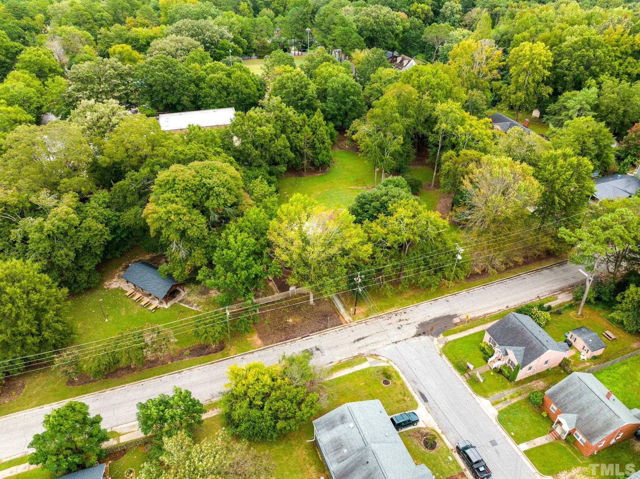 1212 Gatling Street Raleigh, NC 27610 - Photo 3 of 15 a view of a garden with an outdoor seating