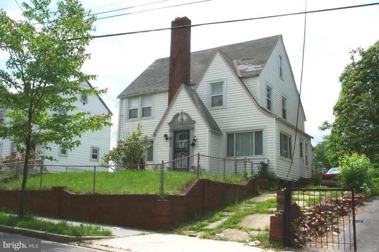 906 48th Street Northeast Washington, DC 20019 - Photo 1 of 1 a view of a house with a yard