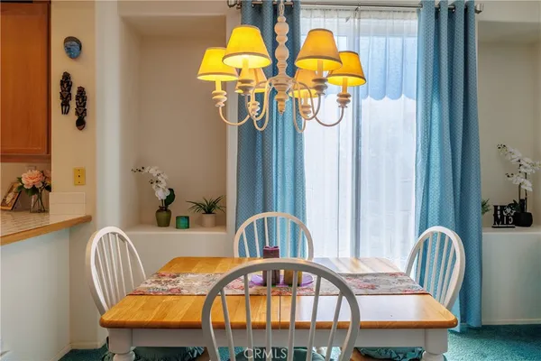 a view of a balcony with chairs
