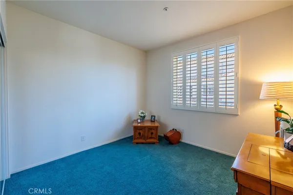 a room with furniture and a window