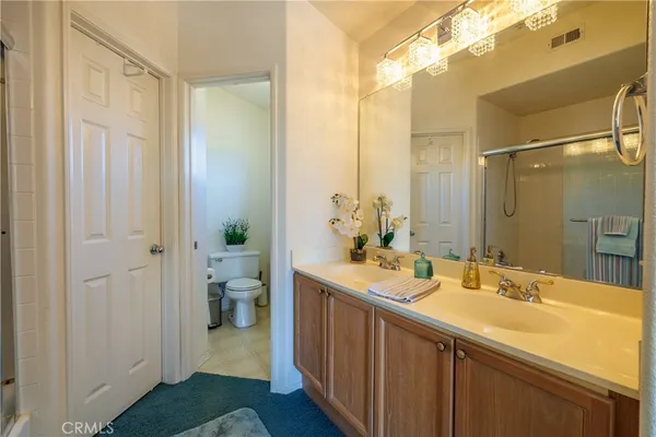 a bathroom with a tub and shower