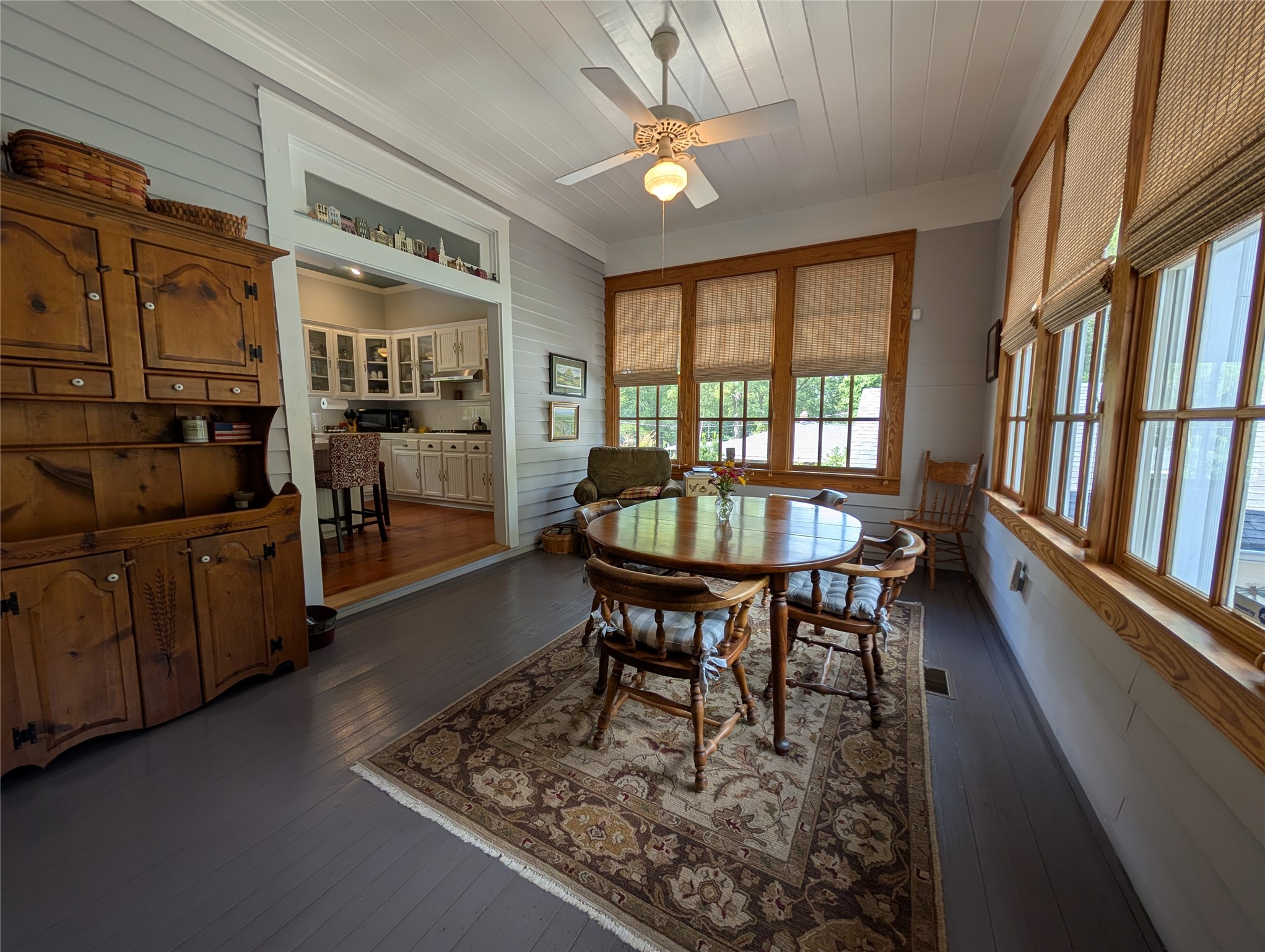 414 Spring Street Washington, GA 30673 - Photo 27 of 42 a dining room with furniture and a floor to ceiling window