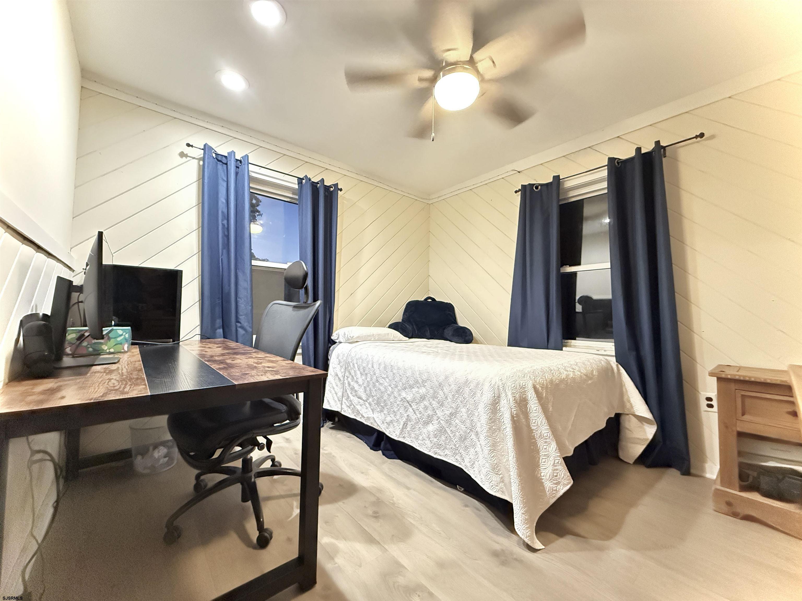 605 Shore Road Linwood, NJ 08221 - Photo 26 of 99 a bedroom with a bed and a table