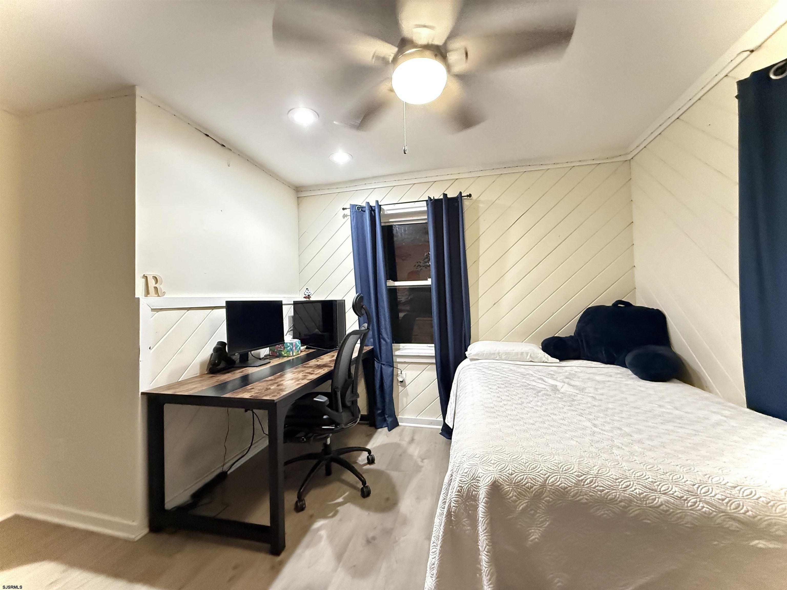 605 Shore Road Linwood, NJ 08221 - Photo 27 of 99 a bedroom with a bed and a desk