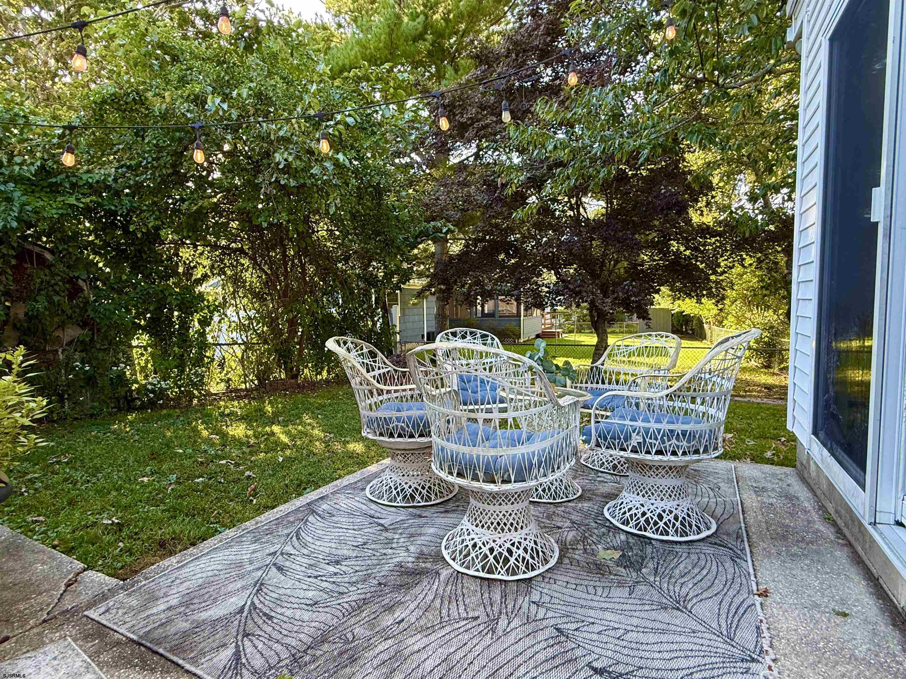 605 Shore Road Linwood, NJ 08221 - Photo 61 of 99 a view of a patio with chairs and potted plants