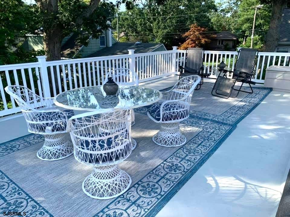 605 Shore Road Linwood, NJ 08221 - Photo 65 of 99 a view of a chair and table