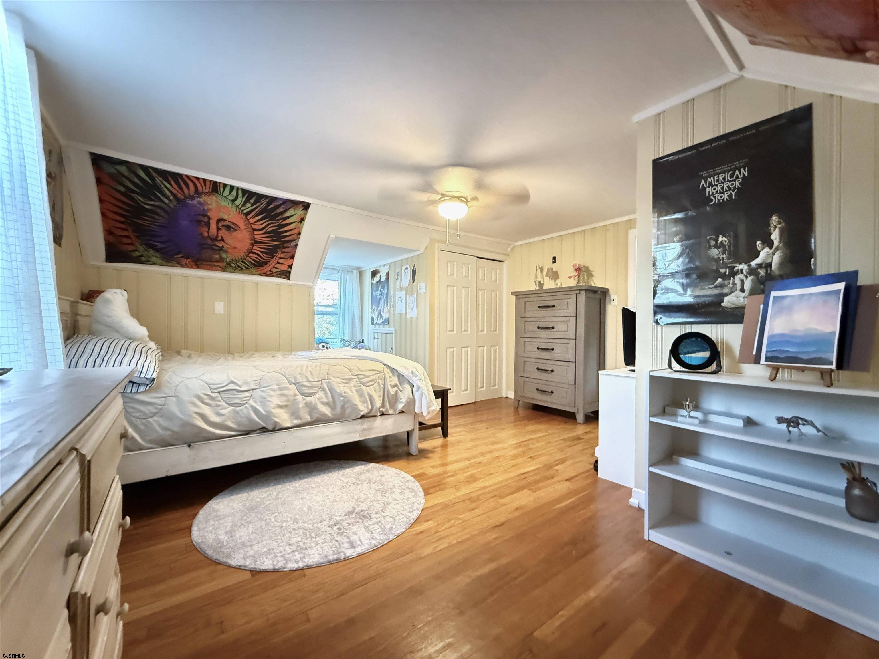 605 Shore Road Linwood, NJ 08221 - Photo 98 of 99 a bedroom with a bed and a flat screen tv