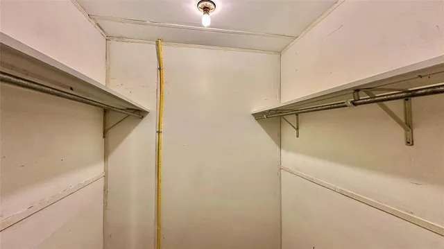 a bathroom with a shower and a shower