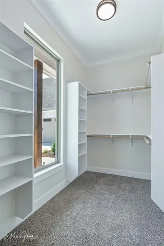 a view of room with walk in closet