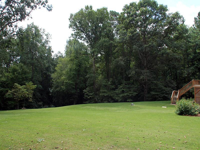 8216 Inverstone Lane Raleigh, NC 27606 - Photo 23 of 25 Wonderful winter views of pond & Lake Wheeler. Yard