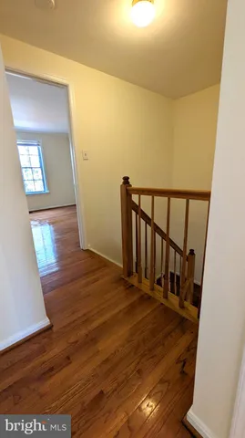 a view of entryway with wooden floor