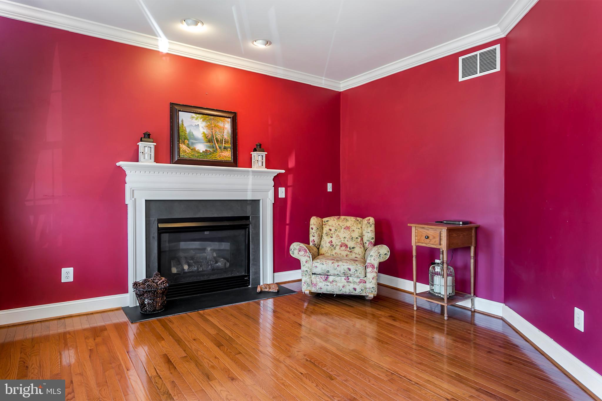 13 Johnson Road Pasadena, MD 21122 - Photo 25 of 28 Formal living room with gas fireplace