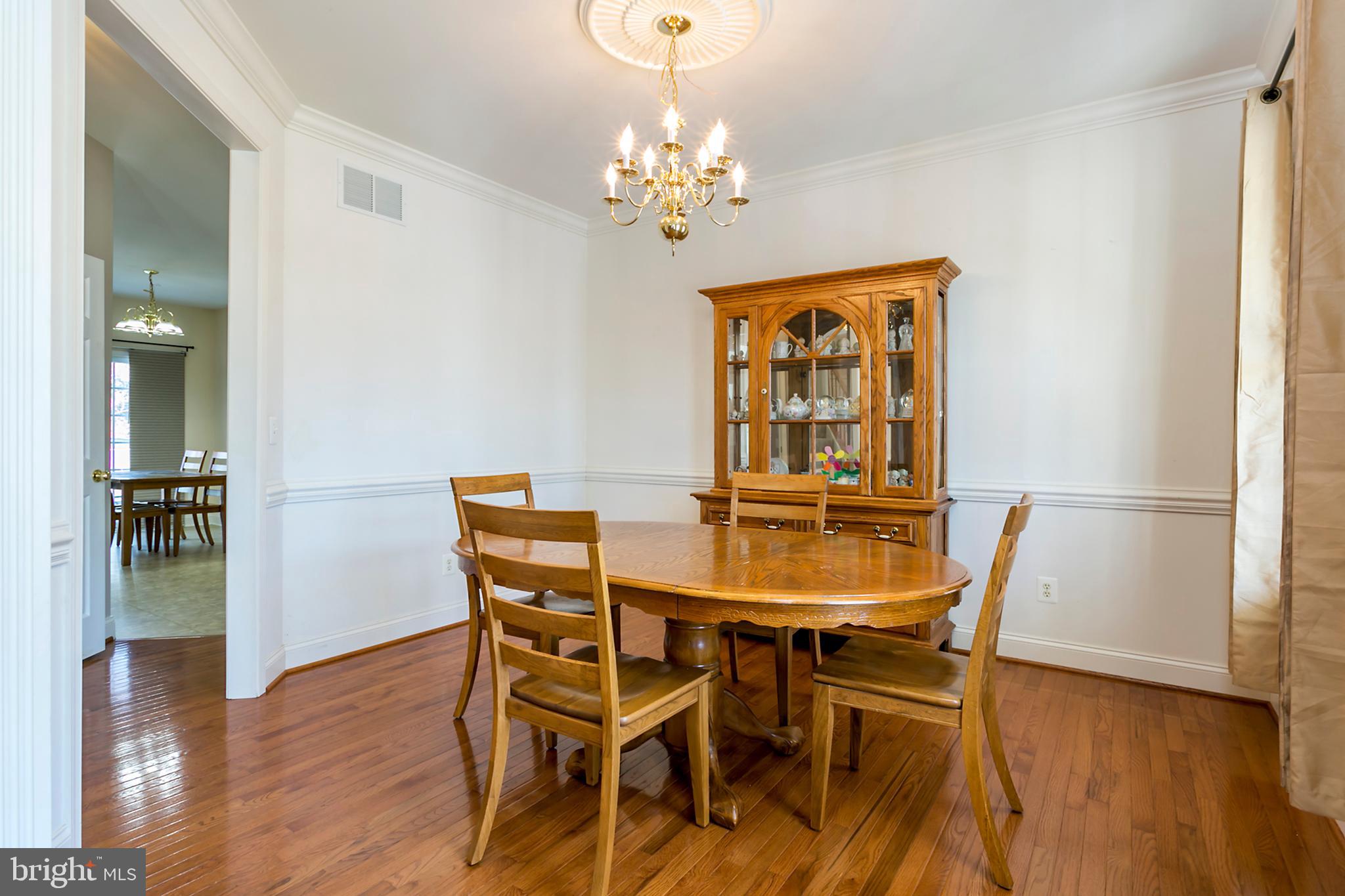 13 Johnson Road Pasadena, MD 21122 - Photo 27 of 28 Formal dining room with hardwood floors