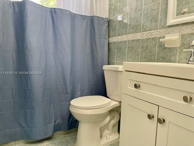 330 West 40th Place Hialeah, FL 33012 - Photo 20 of 20 a bathroom with a sink a toilet and shower
