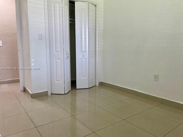 330 West 40th Place Hialeah, FL 33012 - Photo 8 of 20 an empty room with a bathroom