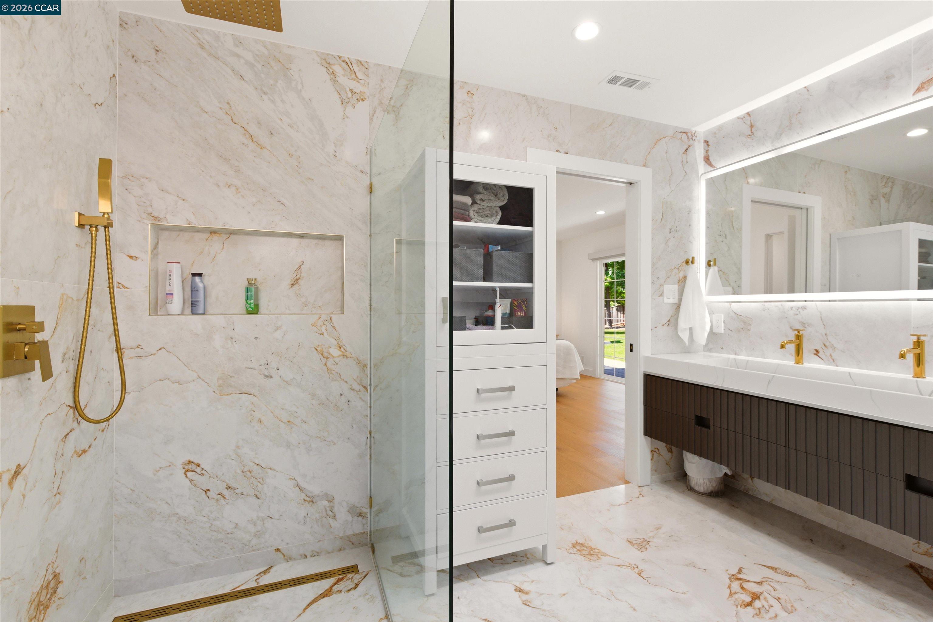 3298 Gloria Terrace Lafayette, CA 94549 - Photo 12 of 40 a bathroom with a tub sink and mirror