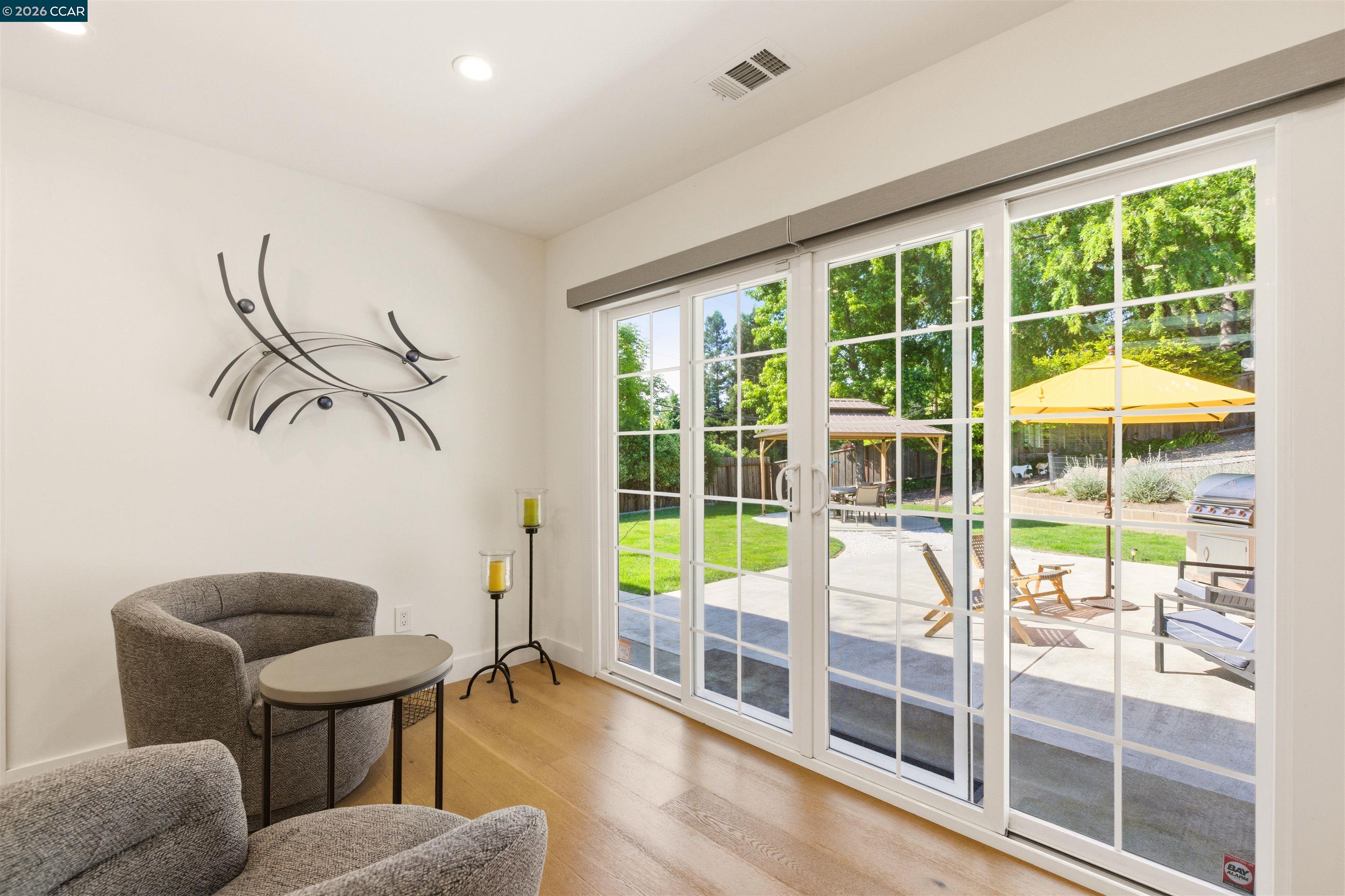 3298 Gloria Terrace Lafayette, CA 94549 - Photo 20 of 40 a living room with furniture and a large window